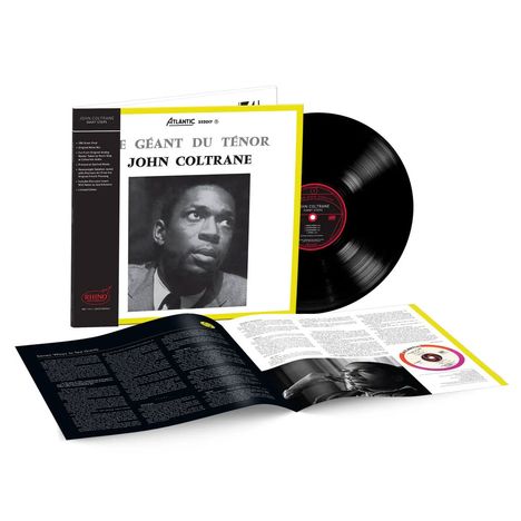 Der Text "LE GÉANT DU TÉNOR JOHN COLTRANE" erscheint auf einem Schallplattencover mit einem Schwarz-Weiß-Foto des Musikers.