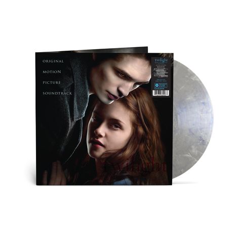"Original Motion Picture Soundtrack" steht links. Zwei Personen, ein Mann und eine Frau, sind eng nebeneinander abgebildet.