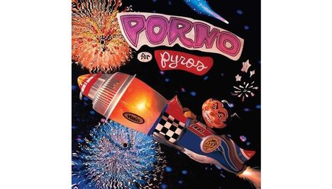 "Porno for Pyros" steht oben, darunter fliegt eine Rakete mit einem lächelnden Gesicht durch bunte Feuerwerkskörper.
