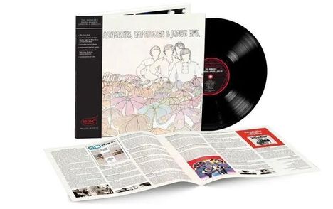 Text: "The Monkees" und "Headquarters," Cover zeigt gezeichnete Figuren und Kopfhörer. Enthält eine aufgeklappte Broschüre.