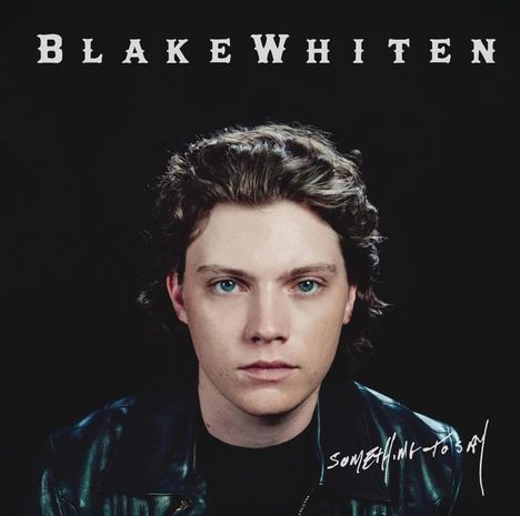 Text: "BLAKE WHITEN" oben, "Something to Say" unten. Ein junger Mann mit lockigem Haar und Lederjacke schaut direkt.