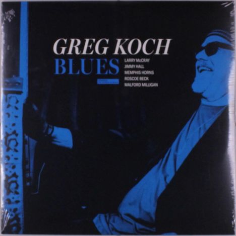 Text: "GREG KOCH BLUES." Namen darunter: "LARRY McCRAY, JIMMY HALL, MEMPHIS HORNS, ROSCOE BECK, MALFORD MILLIGAN." Illustrationsstil: Ein Mann lacht.