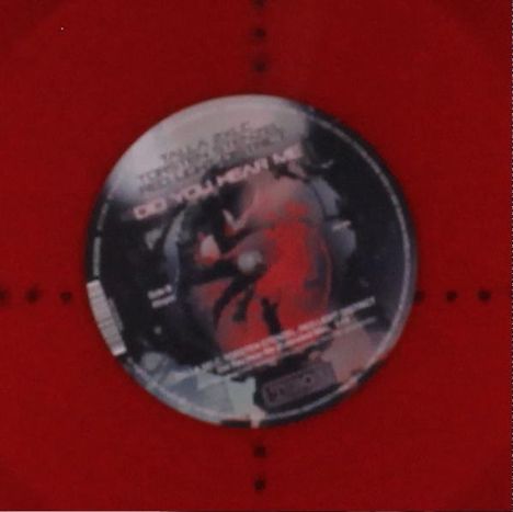 Der Text auf dem Kreis lautet "DO YOU MEAN IT?". Er ist auf rotem Hintergrund platziert.