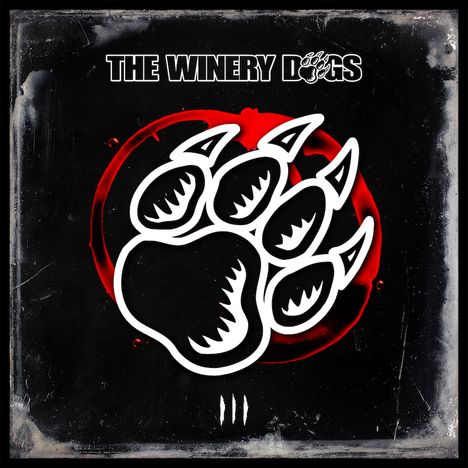"The Winery Dogs" steht oben, darunter eine große Pfotenabdruck-Illustration auf schwarzem Hintergrund mit rotem Kreis.