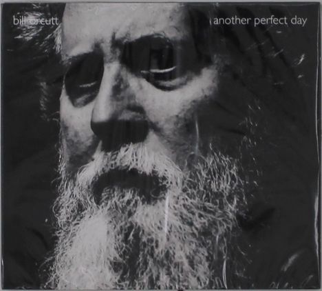 Text: „bill orcutt“, „another perfect day“. Schwarz-weißes Porträt eines Mannes mit dichtem Bart.