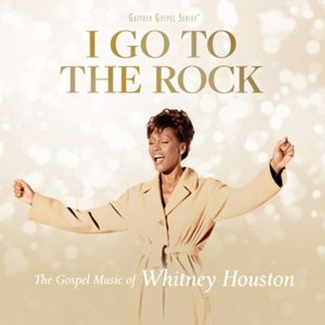 "I Go to the Rock" und "The Gospel Music of Whitney Houston" stehen oben. Eine Frau in beigem Mantel schaut glücklich.