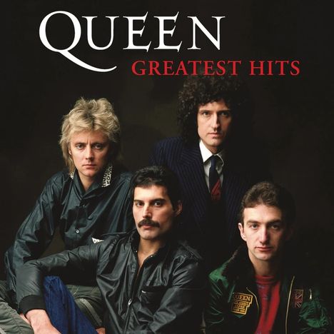 Text: "QUEEN GREATEST HITS". Vier Personen in unterschiedlicher Kleidung und mit verschiedenen Frisuren, frontal blickend.