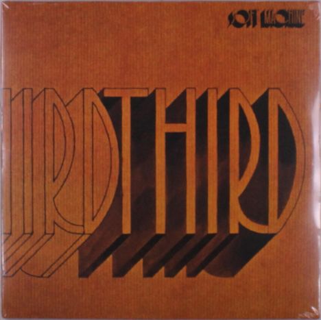 Oben rechts steht "Soft Machine". In der Mitte: "Third" in großen, orangefarbenen Buchstaben mit 3D-Effekt.