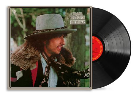 Text: "BOB DYLAN DESIRE". Cover zeigt einen Mann mit Hut und Pelzmantel. Rechts eine schwarze Vinyl-Schallplatte.