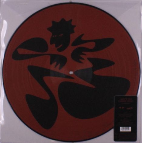 Keine sichtbaren Texte. Eine Schallplatte mit abstrakter schwarzer Figur auf rotem Hintergrund.