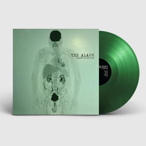 Text: "THE ALARM, TRANSFORMATION". Cover zeigt ein Röntgenbild eines menschlichen Körpers. Grüne Vinyl-Schallplatte.