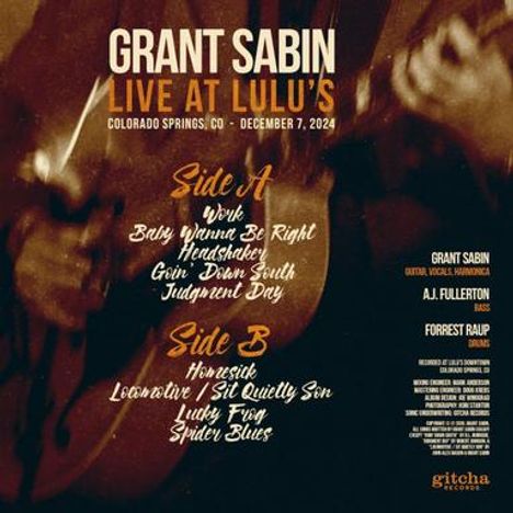"Grant Sabin Live at Lulu's," Titel, Datum und Titel von Seiten A und B. Unscharfe Gitarre im Hintergrund, dunkler Ton.