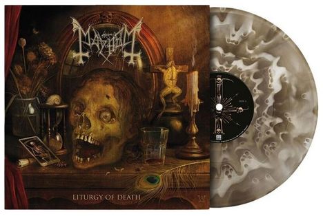"Liturgy of Death" steht vor einem Totenschädel, einem Kruzifix, Kerzen, einem Pfauenfeder-Auge und einer Vinyl-Schallplatte.