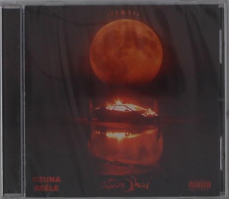 "Ozuna, Beéle" steht unten. Ein brennendes Auto vor einem großen orangen Mond ist zu sehen.