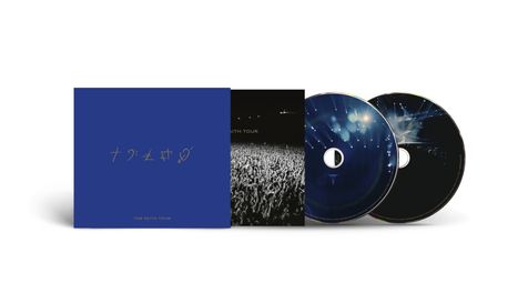 „THE FAITH TOUR“ steht auf einem blauen Cover. Schwarz-weiße Menschenmenge, zwei CDs mit Lichtern und Bühne.