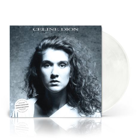 "Celine Dion Unison" und "Edition limitée blanc" steht auf grau-meliertem Hintergrund mit ernstem Porträt einer Frau.
