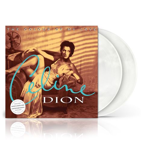 "The Colour of My Love", "Celine Dion". Frau in Abendkleid auf Sofa. Zwei weiße Schallplatten sichtbar.
