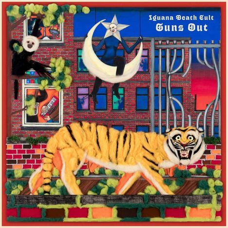 „Iguana Death Cult Guns Out“ steht oben. Eine surreale Illustration zeigt einen Tiger, eine Mondfigur und Gebäude.