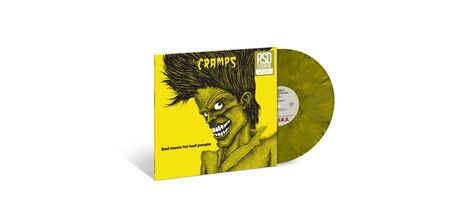 Text: "The Cramps" und "Bad music for bad people". Illustration: Grinsender Kopf mit hochgestyltem Haar auf gelbem Hintergrund.