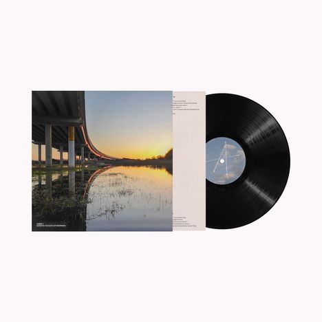Es ist eine Schallplatte. Links im Cover ein Autobahnbrückenfoto bei Sonnenuntergang, der Text beschreibt Musikstücke.