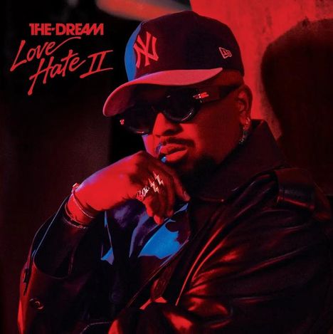 Text: "THE-DREAM Love Hate II". Ein Mann in rotem Licht, trägt eine NY-Kappe, Sonnenbrille und Lederjacke.