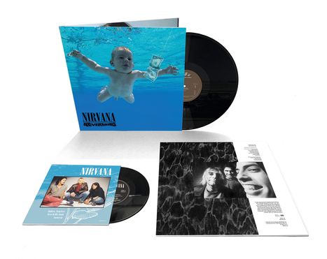 "Nirvana Nevermind" ist auf einem blauen Albumcover. Es zeigt ein Baby unter Wasser. Weitere Bilder und Schallplatten sind sichtbar.