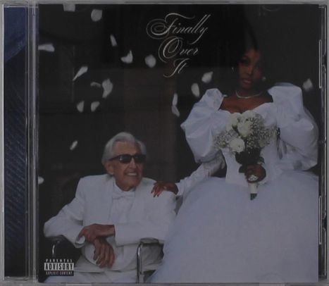 Text: "Finally Over It." Ein älterer Mann und eine junge Frau in Hochzeitskleidung, sie hält einen Blumenstrauß.