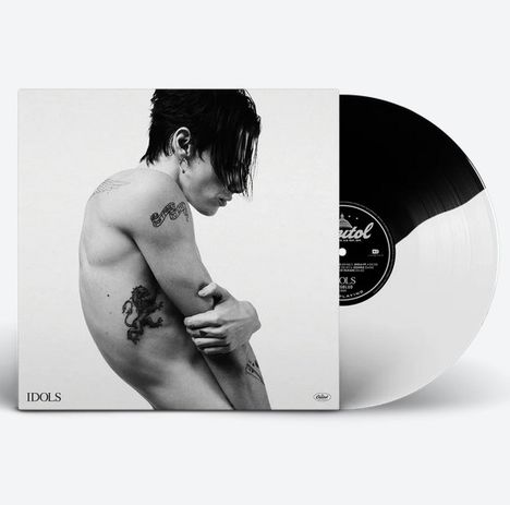 Text: "IDOLS". Schwarz-weißes Cover zeigt eine tätowierte Person in seitlicher Pose und eine Schallplatte.