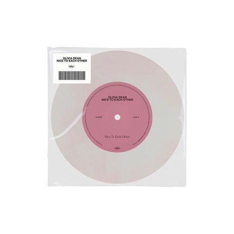 Runde Schallplatte mit rosa Etikett: "Olivia Dean, Nice To Each Other". In klarer Plastikhülle.