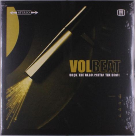 Text: "VOLBEAT", "ROCK THE REBEL/METAL THE DEVIL", "STEREO". 
Ein goldener Stab mit Funken auf dunklem Hintergrund.
