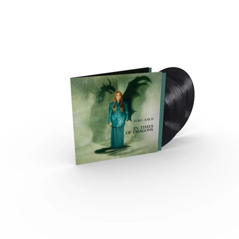 Text: "Tori Amos, In Times of Dragons". Illustration einer Frau in Blau mit Drachen-Schatten.