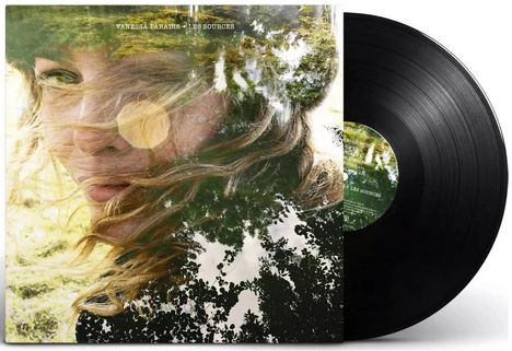 Text: "Vanessa Paradis - Les Sources". Ein Cover mit einem Gesicht, Haaren im Wind und überblendeten Baumblättern.