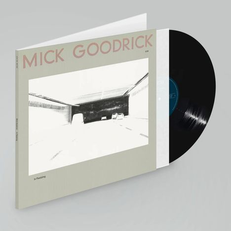 Text: "MICK GOODRICK" und "In Pas(s)ing". Schallplatte in Hülle mit Zeichnung eines Straßentunnels.