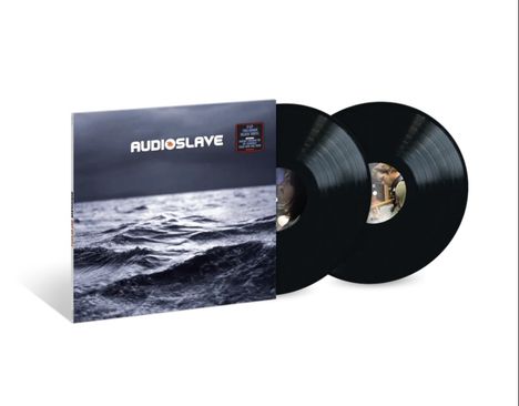 Text: "AUDIOSLAVE". Schwarze Vinylplatten und ein Cover mit einem Bild von stürmischem Wasser.