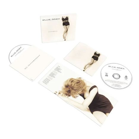 CD-Set mit Text "MYLENE FARMER", "Anamorphosée". Frau in Schwarz-Weiß auf Hüllen und Booklet.
