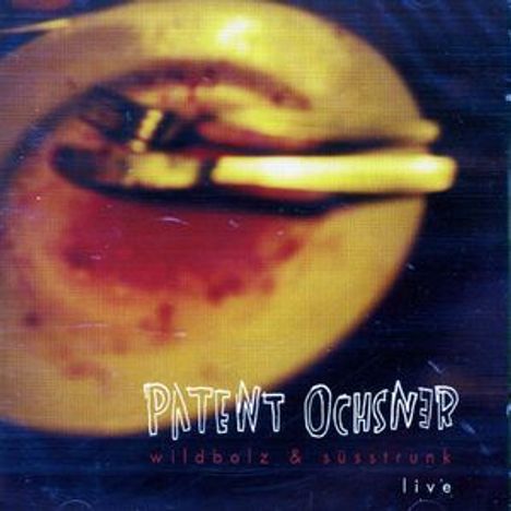 Text: "PATENT OCHSNER, wildbolz & süsstrunk, live." Verschwommenes Bild eines Tellers mit Besteck.