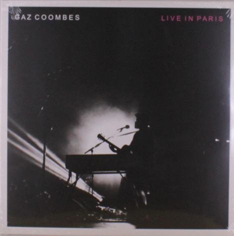 Text: "GAZ COOMBES", "LIVE IN PARIS". Silhouette eines Musikers mit Gitarre und Mikrofon vor hellem Licht.