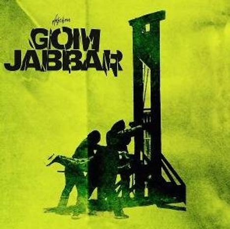Text "GOM JABBAR" prominent. Silhouette einer Guillotine mit Figuren davor auf gelbem Hintergrund.