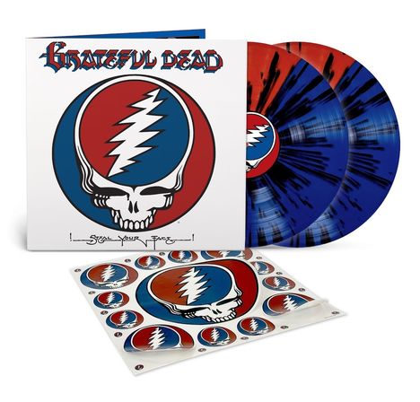 "Grateful Dead" und "Steal Your Face" sind in einer Illustration eines Totenkopfs mit blau-rot Blitz und bunten Schallplatten sichtbar.