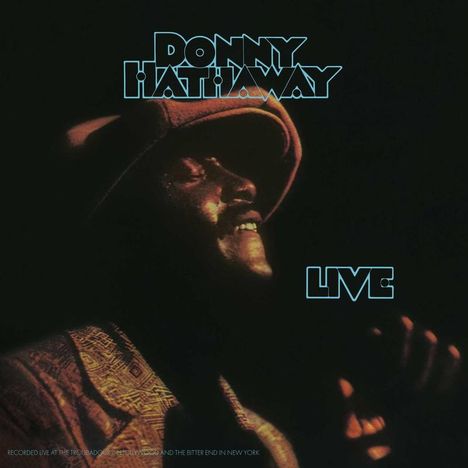 Text oben: "Donny Hathaway", unten: "Live". Ein Sänger mit Hut singt leidenschaftlich in einem dunklen Ambiente.