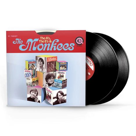 "The A's, The B's & The Monkees" steht auf einem Album-Cover. Zwei Vinyl-Schallplatten ragen heraus.