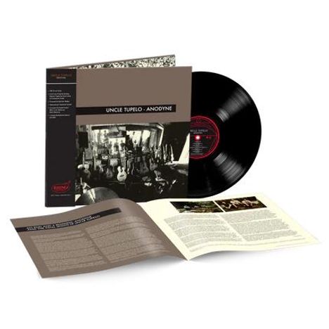 "Uncle Tupelo - Anodyne"; 180-Gramm Vinyl, Limited Edition. Schwarz-weißes Foto mit Gitarren in einem Raum.