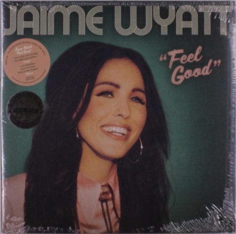 "JAIME WYATT" und "Feel Good" ist zu lesen. Eine Frau mit langem dunklem Haar lächelt. Sie trägt eine helle Bluse.