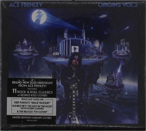 Titel: ACE FREHLEY - ORIGINS VOL. 2. Ein Musiker in futuristischer Kulisse mit Gitarre, Gebäude im Hintergrund.