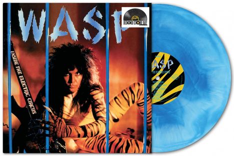 Text: "INSIDE THE ELECTRIC CIRCUS", "W.A.S.P." 
Mann in Tiger-Muster, blaue Schallplatte, aggressive Pose.