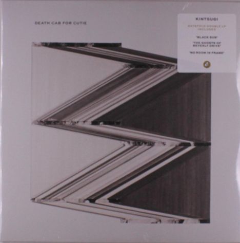 Text: "Death Cab for Cutie", "Kintsugi", Songs: "Black Sun", "The Ghosts of Beverly Drive", "No Room in Frame." Schwarz-weißes Zickzack-Muster.