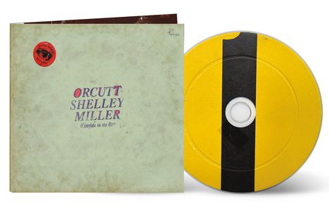 Der Text auf einem hellen Hintergrund lautet: "ORCUTT SHELLEY MILLER (Complete on one disc)". Daneben eine gelbe CD mit schwarzem Streifen.