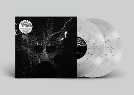 Text "CHRISTIAN PROMMER RHYTHMIQUE NOCTURNE" in weißem Kreis, weiße Sprenkel auf schwarzem Cover, zwei transparente Vinyl-Schallplatten.