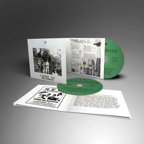 Text: "Camper Van Beethoven." Grüne CDs im Albumcover. Schwarze-weiße Broschüre mit Konzertdatums. Logo mit Stern oben.