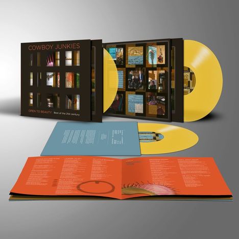 "Cowboy Junkies: Open to Beauty. Best of the 21st century." Gelbe Schallplatten mit Album-Cover und farbigen Booklets.